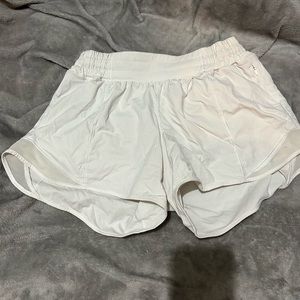White Lululemon hottie hot shorts in size 6, 4” inseam